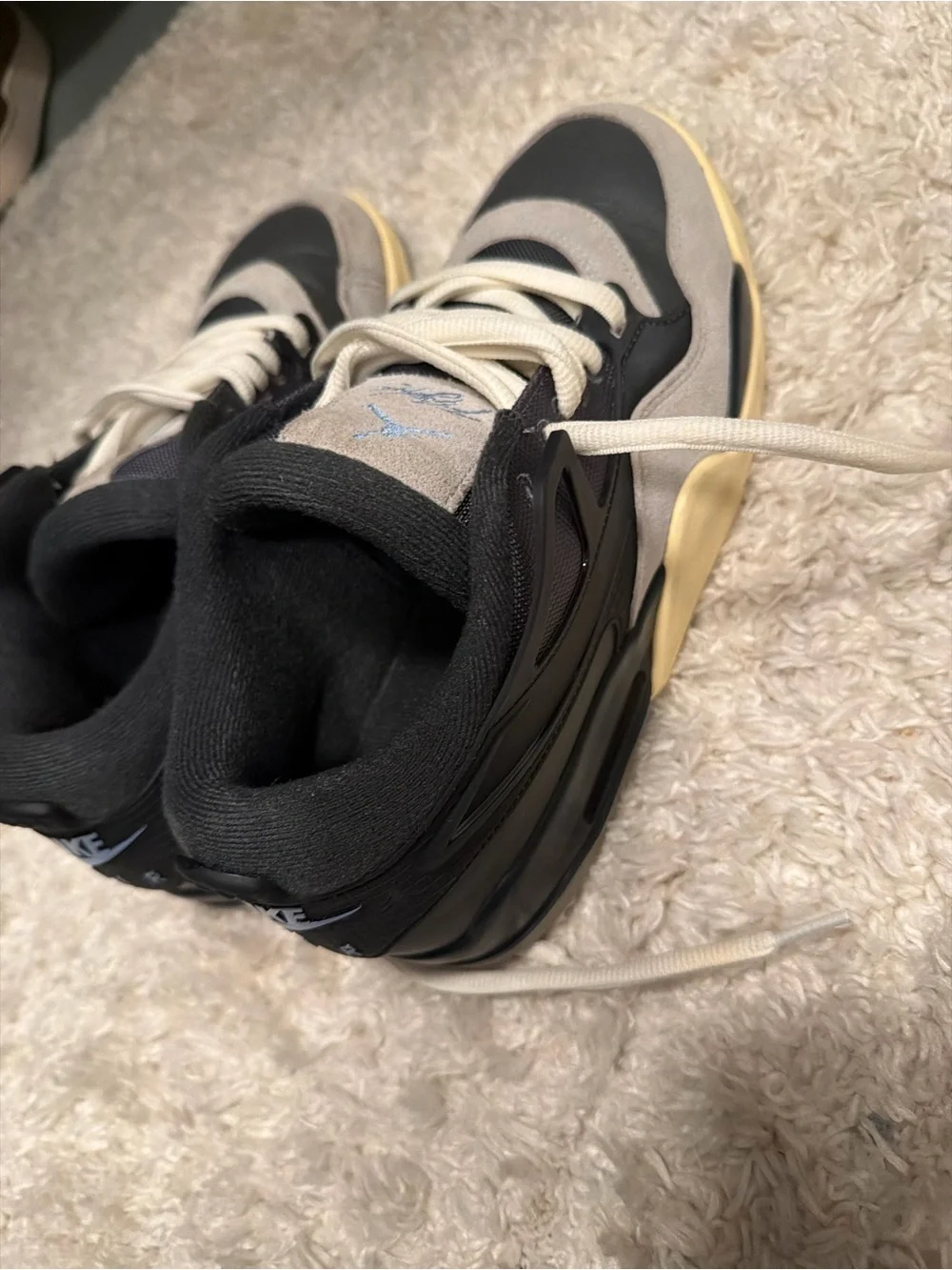 Jordan men’s Low-Top Sneakers in Black, Gray and Cream with Light Blue Jumpman